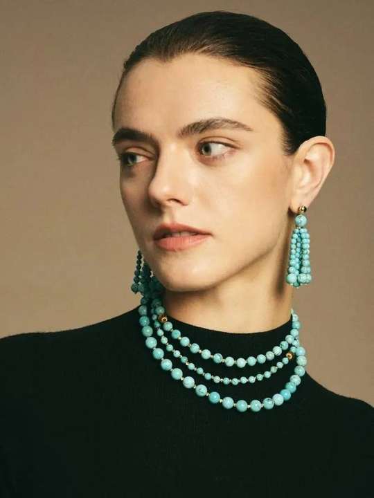 Natural turquoise necklace worn in three layers