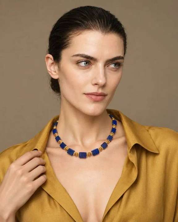 Square lapis statement necklace worn by model