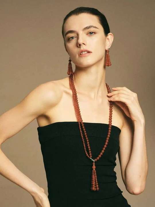 Red agate necklace worn long
