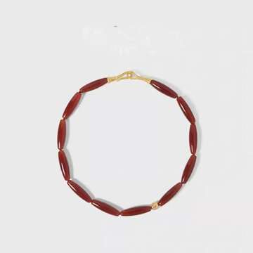 Red agate teardrop choker with gold-tone details