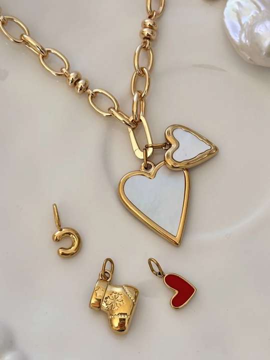 Double-heart mother-of-pearl, initial and holiday pendant details