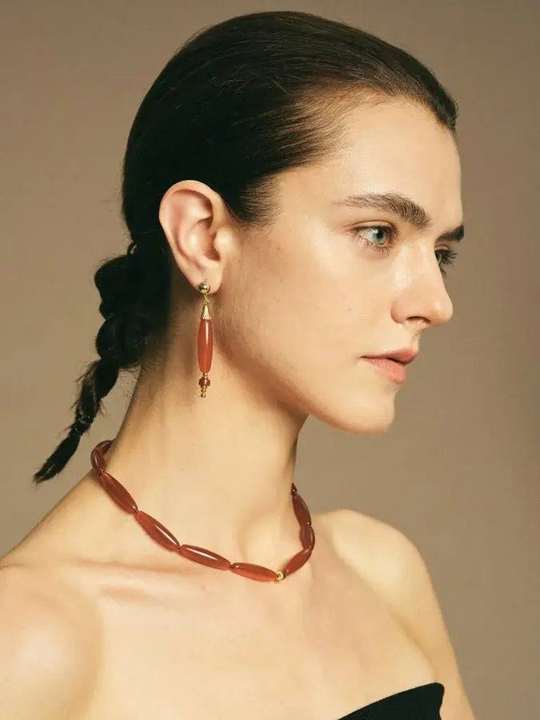 Red agate choker and drop earrings in profile